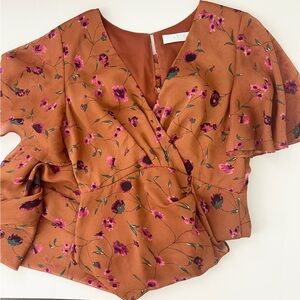 Astr Rust Floral Wrap Blouse with Pink Accent